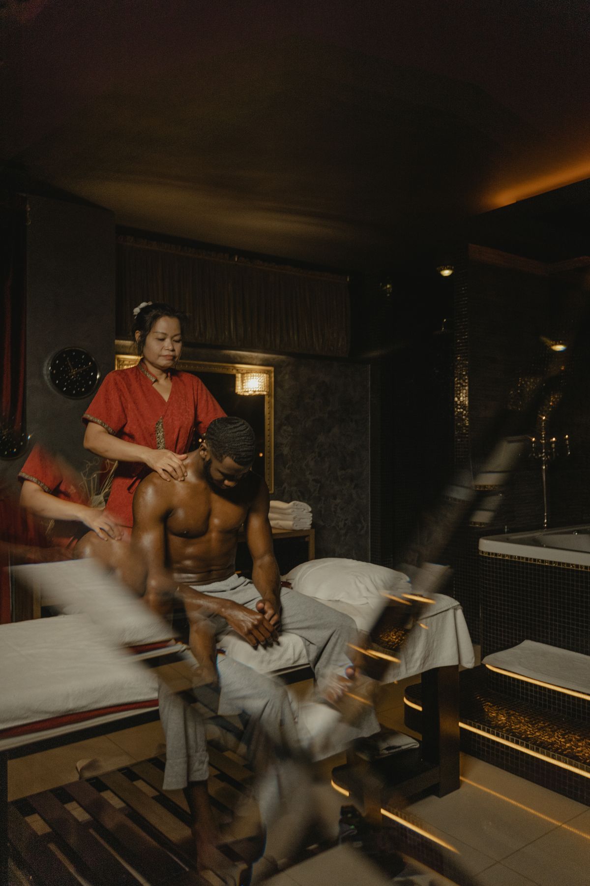 Full-body massage in a warm room